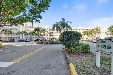 Stunning fully remodeled 1,370 SF first-floor residence blending on Sunrise Lakes Phase IV Golf Course in Florida - for sale on GolfHomes.com, golf home, golf lot