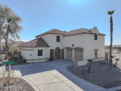 This spacious 2-story custom pool home in the gated Los Lagos on Los Lagos Golf Club in Arizona - for sale on GolfHomes.com, golf home, golf lot