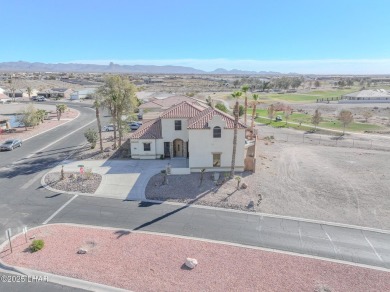 This spacious 2-story custom pool home in the gated Los Lagos on Los Lagos Golf Club in Arizona - for sale on GolfHomes.com, golf home, golf lot