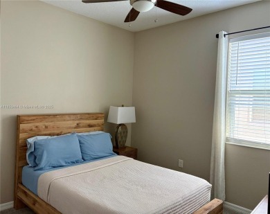Stunning, move-in ready 4-bed, 2-bath home in the desirable on Royal St. Cloud Golf Links in Florida - for sale on GolfHomes.com, golf home, golf lot