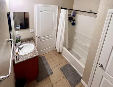 Stunning, move-in ready 4-bed, 2-bath home in the desirable on Royal St. Cloud Golf Links in Florida - for sale on GolfHomes.com, golf home, golf lot