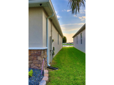 Stunning, move-in ready 4-bed, 2-bath home in the desirable on Royal St. Cloud Golf Links in Florida - for sale on GolfHomes.com, golf home, golf lot