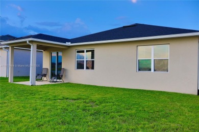 Stunning, move-in ready 4-bed, 2-bath home in the desirable on Royal St. Cloud Golf Links in Florida - for sale on GolfHomes.com, golf home, golf lot