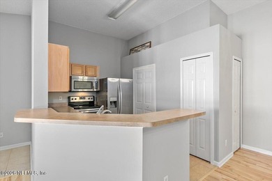 Welcome to 37 Jardin De Mer, a light-filled 2nd-floor condo on Jacksonville Beach Golf Course in Florida - for sale on GolfHomes.com, golf home, golf lot