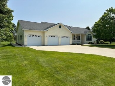 CHIC - ELEGANT - SPACIOUS!  Step into this warm and welcoming on The Pines Golf Course at Lake Isabella in Michigan - for sale on GolfHomes.com, golf home, golf lot