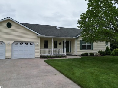 CHIC - ELEGANT - SPACIOUS!  Step into this warm and welcoming on The Pines Golf Course at Lake Isabella in Michigan - for sale on GolfHomes.com, golf home, golf lot