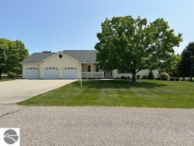 CHIC - ELEGANT - SPACIOUS!  Step into this warm and welcoming on The Pines Golf Course at Lake Isabella in Michigan - for sale on GolfHomes.com, golf home, golf lot
