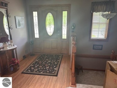 CHIC - ELEGANT - SPACIOUS!  Step into this warm and welcoming on The Pines Golf Course at Lake Isabella in Michigan - for sale on GolfHomes.com, golf home, golf lot