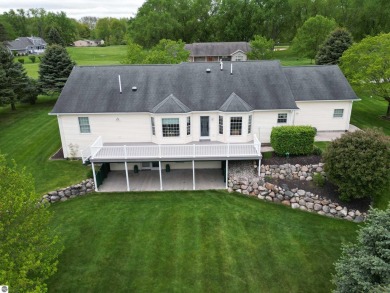 CHIC - ELEGANT - SPACIOUS!  Step into this warm and welcoming on The Pines Golf Course at Lake Isabella in Michigan - for sale on GolfHomes.com, golf home, golf lot