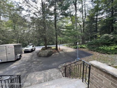 Located among a golf course, fishing spots and pools, tennis on Pocono Farms Country Club in Pennsylvania - for sale on GolfHomes.com, golf home, golf lot