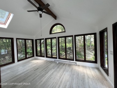 Located among a golf course, fishing spots and pools, tennis on Pocono Farms Country Club in Pennsylvania - for sale on GolfHomes.com, golf home, golf lot