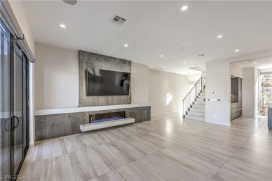 Experience elevated living in this 4-story modern architectural on Dragon Ridge Country Club in Nevada - for sale on GolfHomes.com, golf home, golf lot