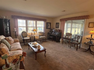 Superb location! You look out the sunroom windows right at the on Leisure Village Golf Course in New York - for sale on GolfHomes.com, golf home, golf lot