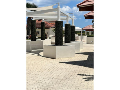 Live in the Heart of Aventura! Step into comfort and style with on Turnberry Isle Resort and Club in Florida - for sale on GolfHomes.com, golf home, golf lot