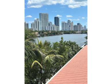 Live in the Heart of Aventura! Step into comfort and style with on Turnberry Isle Resort and Club in Florida - for sale on GolfHomes.com, golf home, golf lot