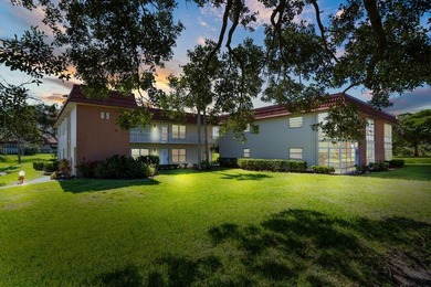 Beautifully updated first-floor unit with golf views! Desirable on The American Golf Club in Florida - for sale on GolfHomes.com, golf home, golf lot