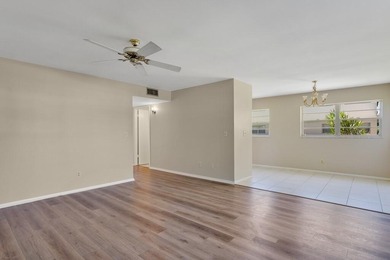 Beautifully updated first-floor unit with golf views! Desirable on The American Golf Club in Florida - for sale on GolfHomes.com, golf home, golf lot