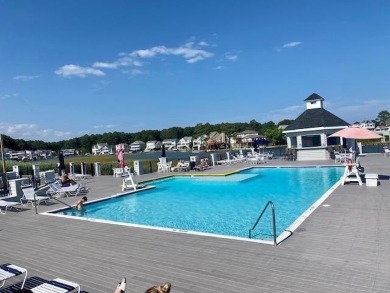 Welcome to this charming 3-bedroom, 2-bath single-level home in on Captains Cove Golf and Yacht Club in Virginia - for sale on GolfHomes.com, golf home, golf lot