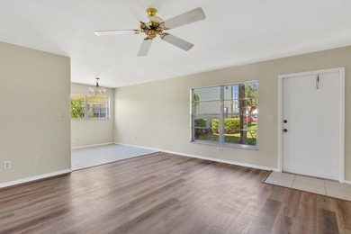 Beautifully updated first-floor unit with golf views! Desirable on The American Golf Club in Florida - for sale on GolfHomes.com, golf home, golf lot