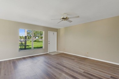 Beautifully updated first-floor unit with golf views! Desirable on The American Golf Club in Florida - for sale on GolfHomes.com, golf home, golf lot