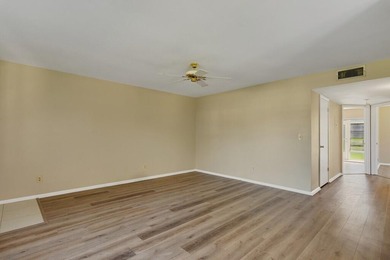 Beautifully updated first-floor unit with golf views! Desirable on The American Golf Club in Florida - for sale on GolfHomes.com, golf home, golf lot