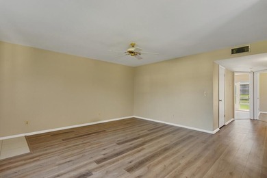 Beautifully updated first-floor unit with golf views! Desirable on The American Golf Club in Florida - for sale on GolfHomes.com, golf home, golf lot