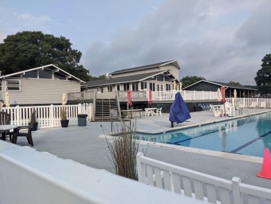 Welcome to this charming 3-bedroom, 2-bath single-level home in on Captains Cove Golf and Yacht Club in Virginia - for sale on GolfHomes.com, golf home, golf lot