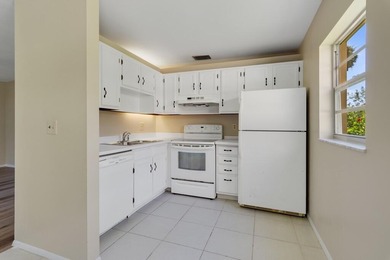 Beautifully updated first-floor unit with golf views! Desirable on The American Golf Club in Florida - for sale on GolfHomes.com, golf home, golf lot