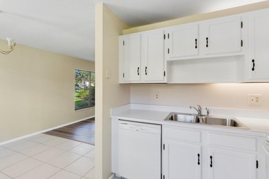 Beautifully updated first-floor unit with golf views! Desirable on The American Golf Club in Florida - for sale on GolfHomes.com, golf home, golf lot
