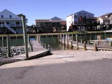 Welcome to this charming 3-bedroom, 2-bath single-level home in on Captains Cove Golf and Yacht Club in Virginia - for sale on GolfHomes.com, golf home, golf lot
