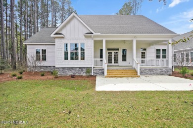 This craftsman style home, spans over 2800 square feet for a on Crow Creek Golf Club in North Carolina - for sale on GolfHomes.com, golf home, golf lot