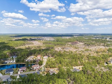 Build your dream home on this prime 3/4 acre lot, perfectly on Eagle Landing Golf Club in Florida - for sale on GolfHomes.com, golf home, golf lot
