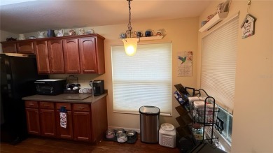 RARE WAKEFIELD MODEL! Located in the upscale 55+ community On on On Top of the World Golf Course in Florida - for sale on GolfHomes.com, golf home, golf lot