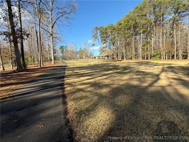 Welcome to an exceptional opportunity to build your dream home on Carolina Trace Country Club in North Carolina - for sale on GolfHomes.com, golf home, golf lot