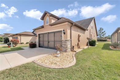 This exceptional two-story garden home, located in Del Webb's on Stone Creek Golf Club in Florida - for sale on GolfHomes.com, golf home, golf lot