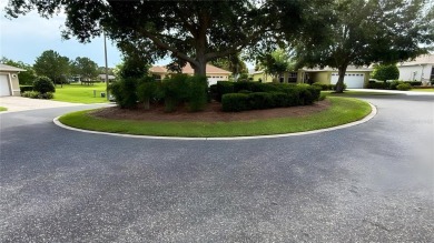 RARE WAKEFIELD MODEL! Located in the upscale 55+ community On on On Top of the World Golf Course in Florida - for sale on GolfHomes.com, golf home, golf lot