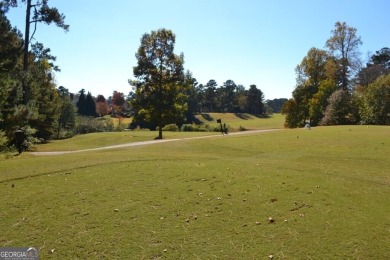 Enjoy this spacious stepless ranch 4 bedroom, 2-bathroom on Mirror Lake Golf Club in Georgia - for sale on GolfHomes.com, golf home, golf lot