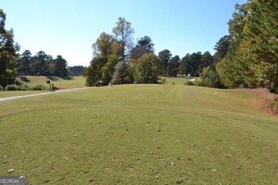Enjoy this spacious stepless ranch 4 bedroom, 2-bathroom on Mirror Lake Golf Club in Georgia - for sale on GolfHomes.com, golf home, golf lot