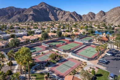 The home is located in the Guard Gated Lake community of Laguna on La Quinta Golf  Resort and Country Clubs in California - for sale on GolfHomes.com, golf home, golf lot