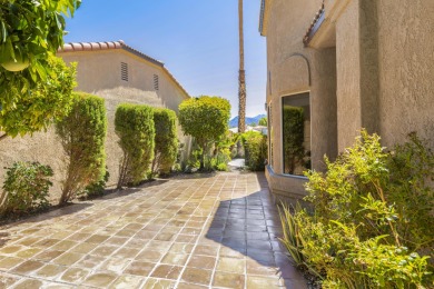 The home is located in the Guard Gated Lake community of Laguna on La Quinta Golf  Resort and Country Clubs in California - for sale on GolfHomes.com, golf home, golf lot