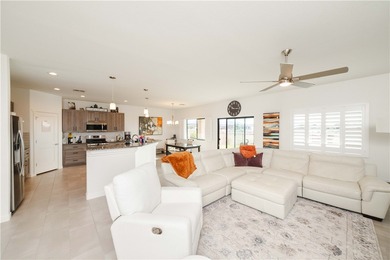 Welcome to this stunning 2021 single-family home located in the on Los Lagos Golf Club in Arizona - for sale on GolfHomes.com, golf home, golf lot