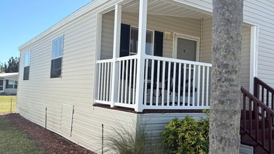 Welcome to this charming 2011 furnished 2-bedroom, 2-bathroom on Sabal Springs Golf and Racquet Club in Florida - for sale on GolfHomes.com, golf home, golf lot