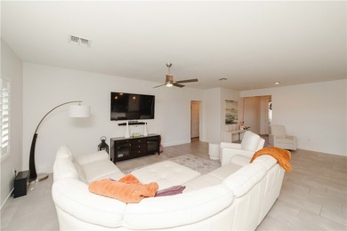 Welcome to this stunning 2021 single-family home located in the on Los Lagos Golf Club in Arizona - for sale on GolfHomes.com, golf home, golf lot