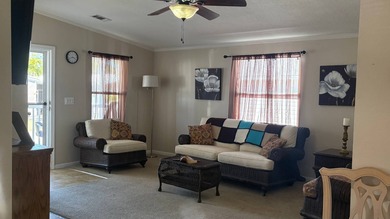 Welcome to this charming 2011 furnished 2-bedroom, 2-bathroom on Sabal Springs Golf and Racquet Club in Florida - for sale on GolfHomes.com, golf home, golf lot