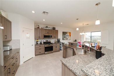 Welcome to this stunning 2021 single-family home located in the on Los Lagos Golf Club in Arizona - for sale on GolfHomes.com, golf home, golf lot