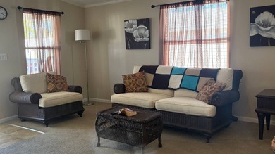 Welcome to this charming 2011 furnished 2-bedroom, 2-bathroom on Sabal Springs Golf and Racquet Club in Florida - for sale on GolfHomes.com, golf home, golf lot