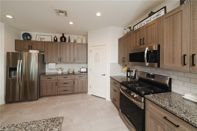 Welcome to this stunning 2021 single-family home located in the on Los Lagos Golf Club in Arizona - for sale on GolfHomes.com, golf home, golf lot