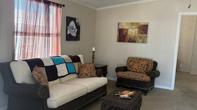 Welcome to this charming 2011 furnished 2-bedroom, 2-bathroom on Sabal Springs Golf and Racquet Club in Florida - for sale on GolfHomes.com, golf home, golf lot