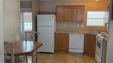 Welcome to this charming 2011 furnished 2-bedroom, 2-bathroom on Sabal Springs Golf and Racquet Club in Florida - for sale on GolfHomes.com, golf home, golf lot