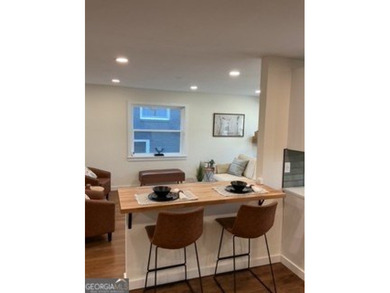 Welcome home! This beautifully remodeled 3-bedroom, 2 bath home on East Lake Golf Club in Georgia - for sale on GolfHomes.com, golf home, golf lot